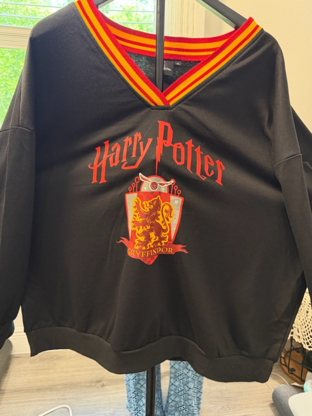Warner Bros. Harry Potter Black Sweatshirt with Red and Yellow Trim - Picture 4 of 4